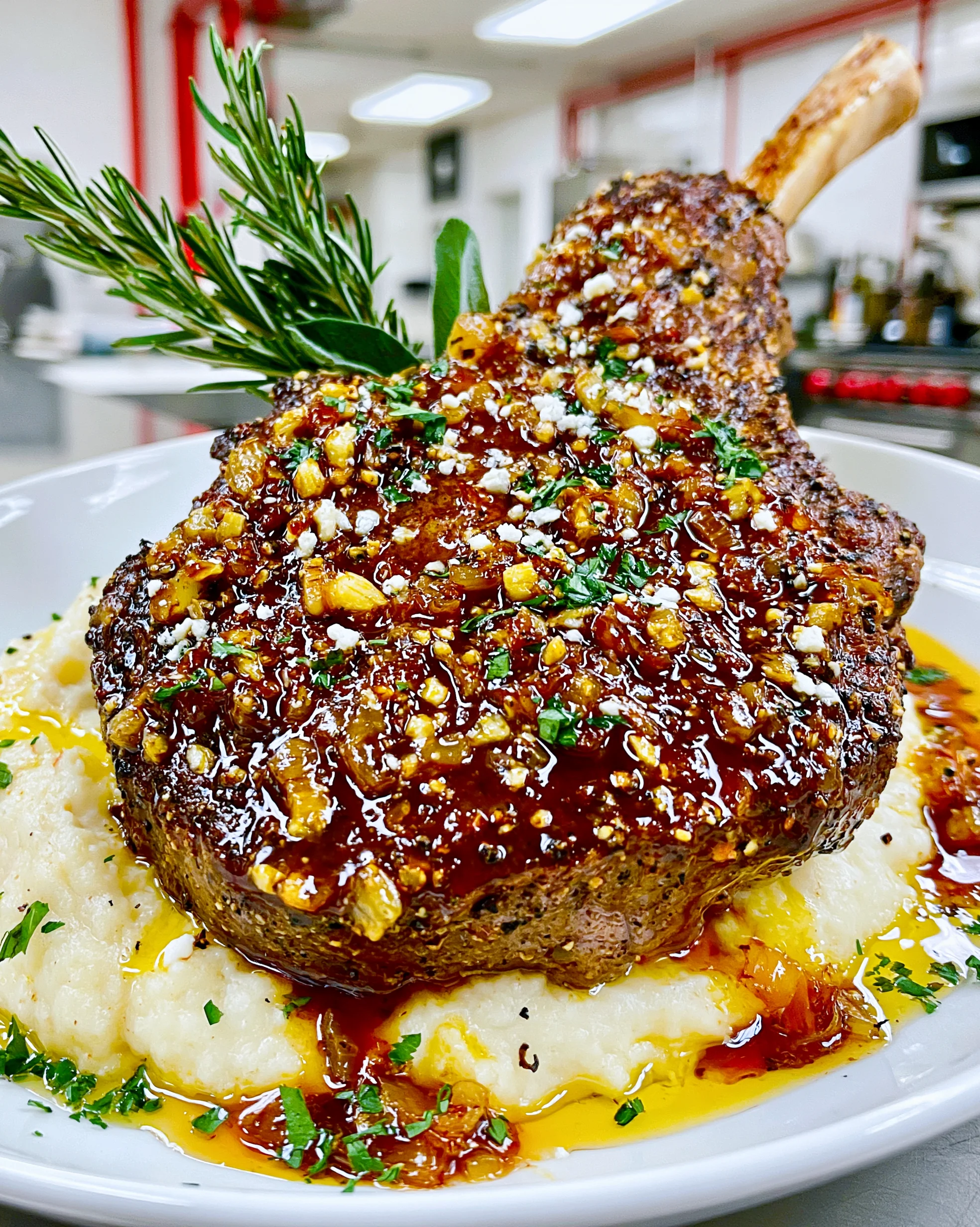 Caramelized Onion and Crushed White Peppercorn-Crusted Tomahawk with a Brown Butter Sage Jus