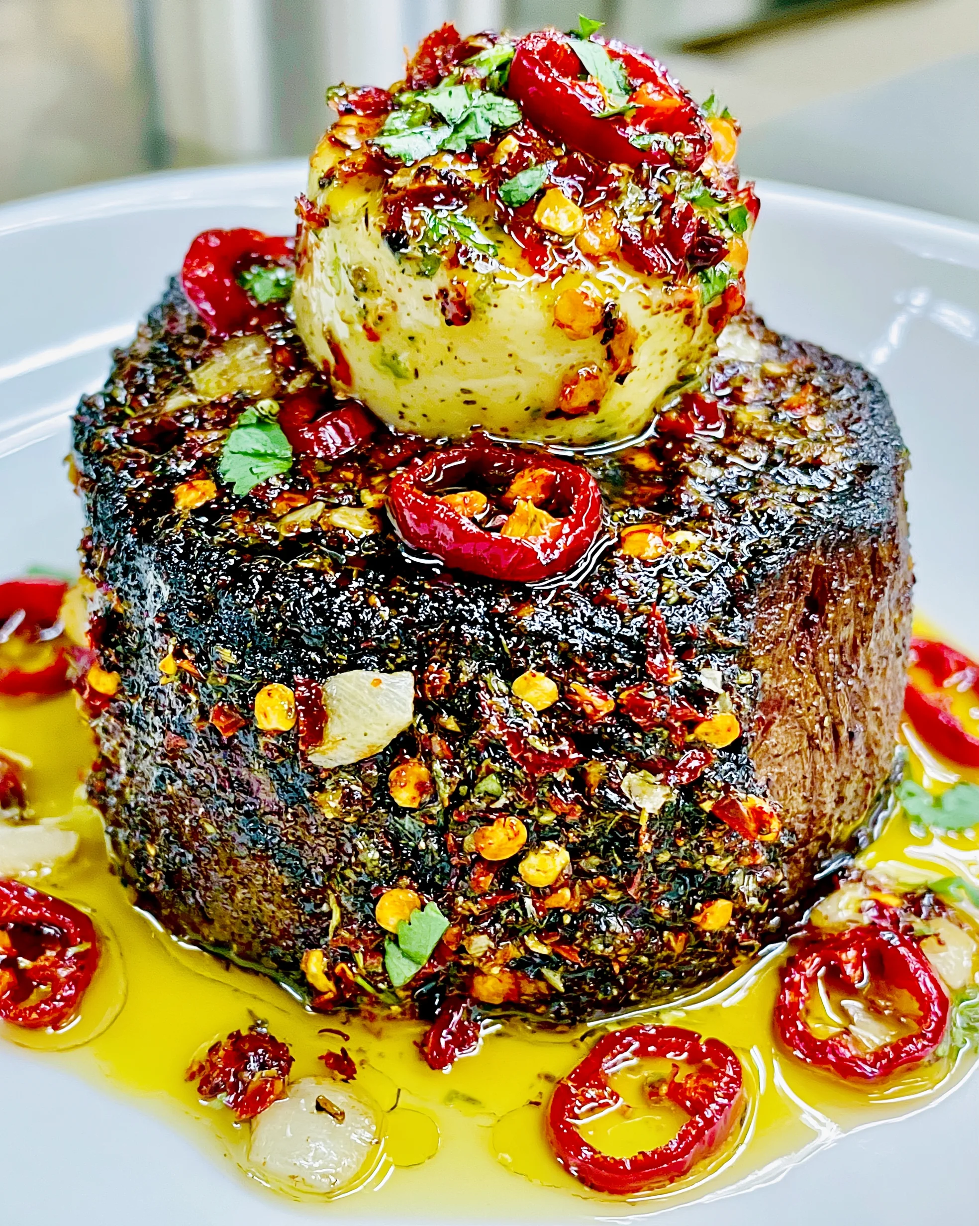 Pomegranate-Molasses and Fire-Roasted Hatch Chili-Crusted Filet Mignon with a Cilantro-Lime Compound Butter