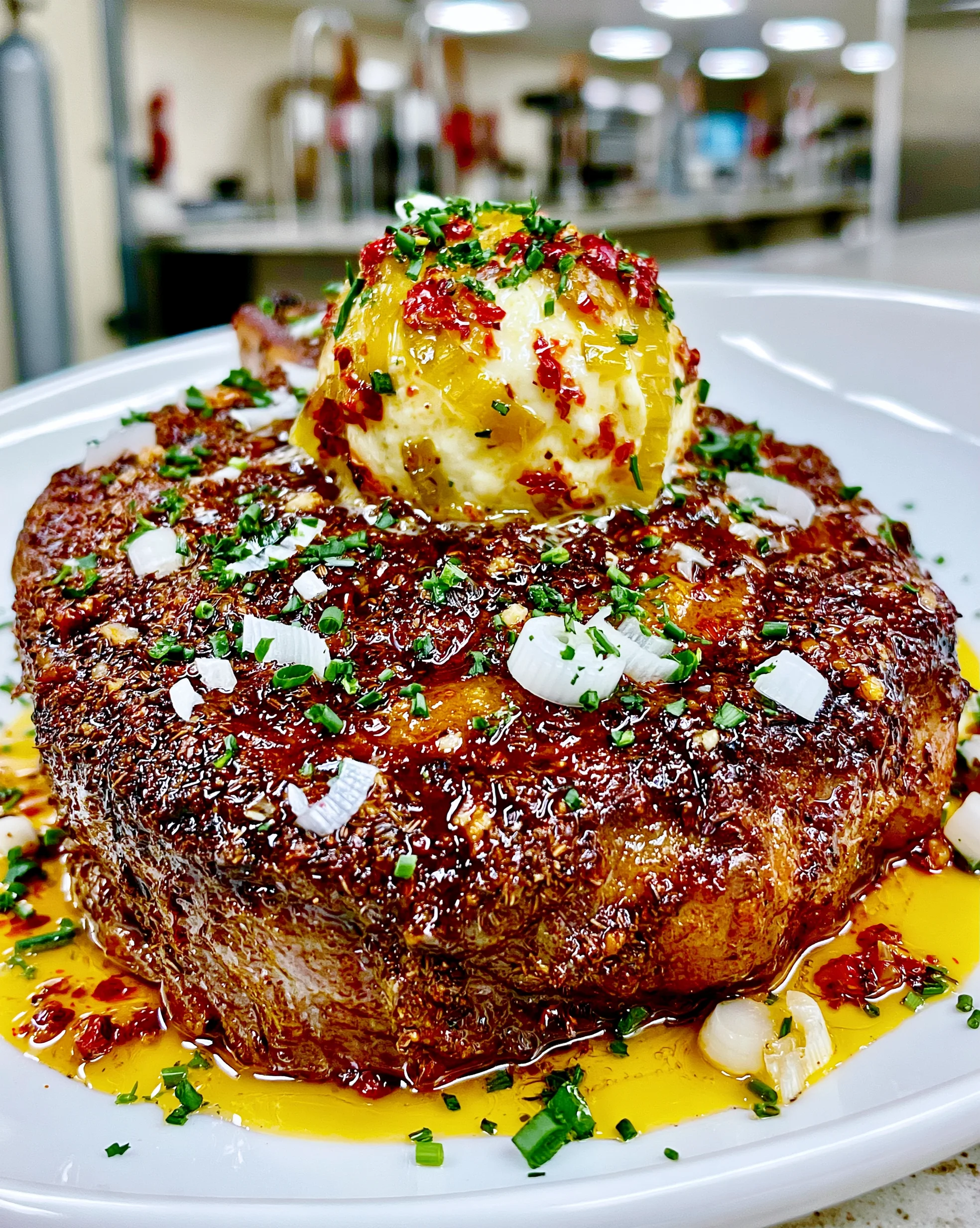 Smoked Hickory and Toasted Caraway-Crusted Ribeye with a Charred Leek Ghee Butter